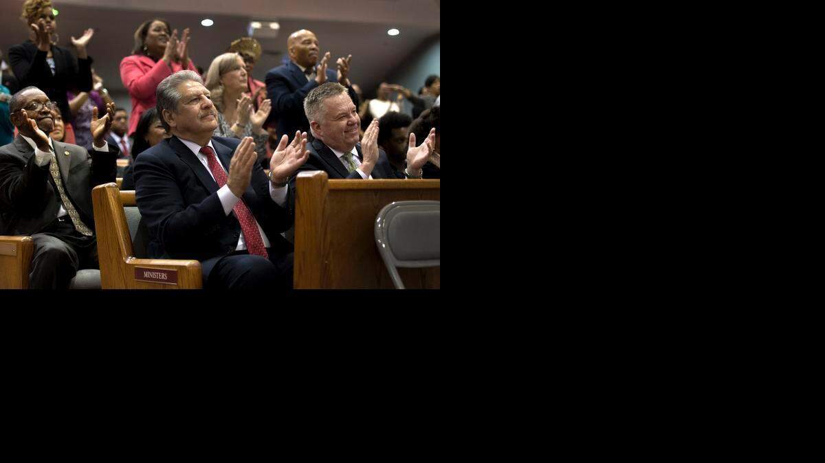 
Sacramento State reaches out to the community to promote the benefits of higher education. As part of the “Super Sunday” event, university President Alexander Gonzalez, center, attended St. Paul Missionary Baptist Church in Sacramento. He spoke to the congregation and then later sat through the two-hour service. Afterward, he answered questions for students.

