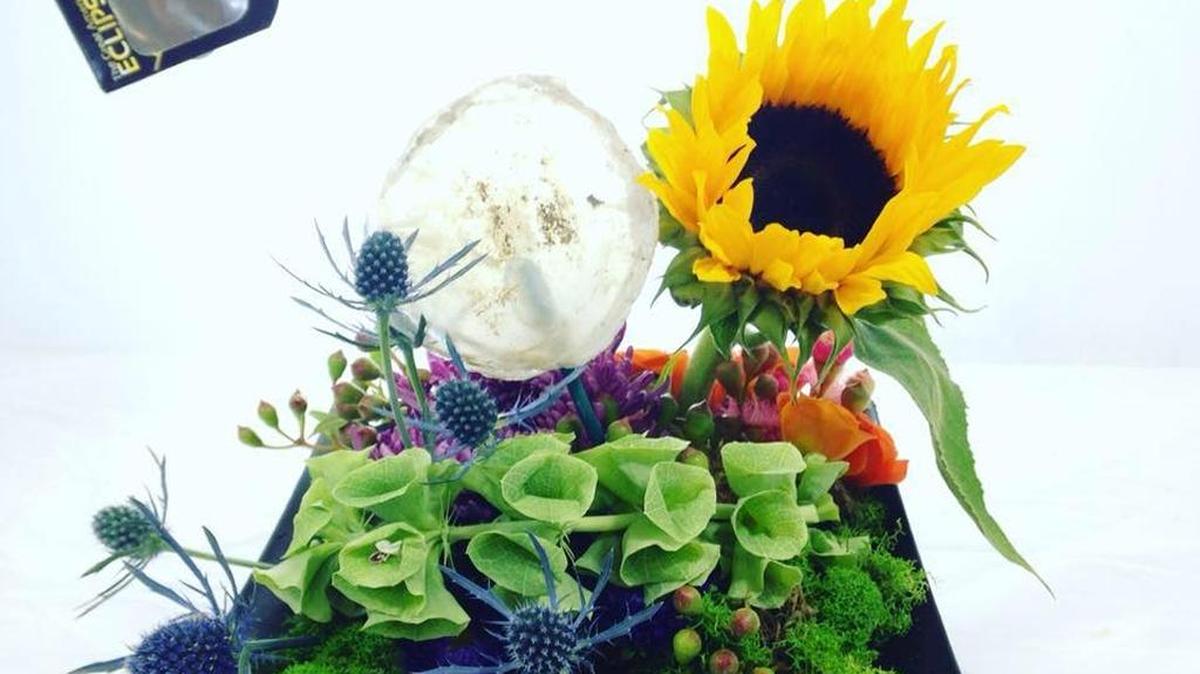 Relles Florist of Sacramento is offering a special bouquet celebrating the Great American Eclipse including ISO-approved eclipse-viewing glasses.