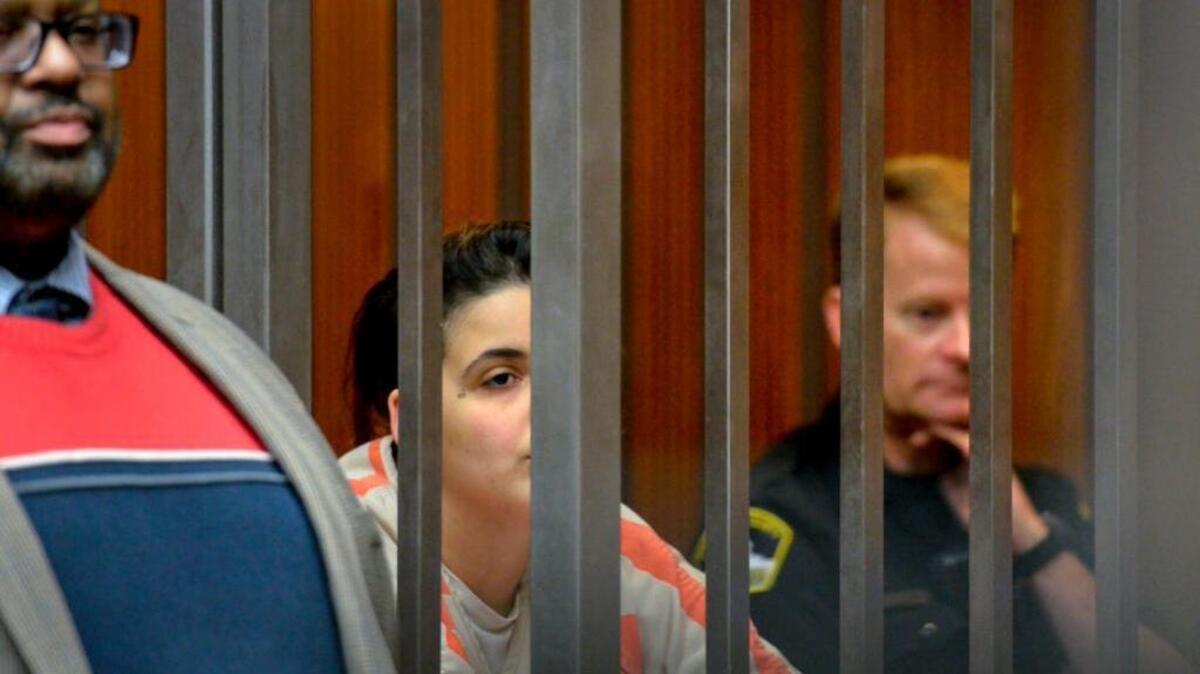 Valerie Curbelo, 24, of Sandy, Oregon is arraigned on Dec. 14, 2017 at Sacramento County Jail after threatening to kill everyone on a Southwest flight when she was caught smoking. She is charged with a felony charge of threatening to commit a crime that would result in death or great bodily injury. Sacramento County Deputy Public Defender Mark Slaughter is to the left.