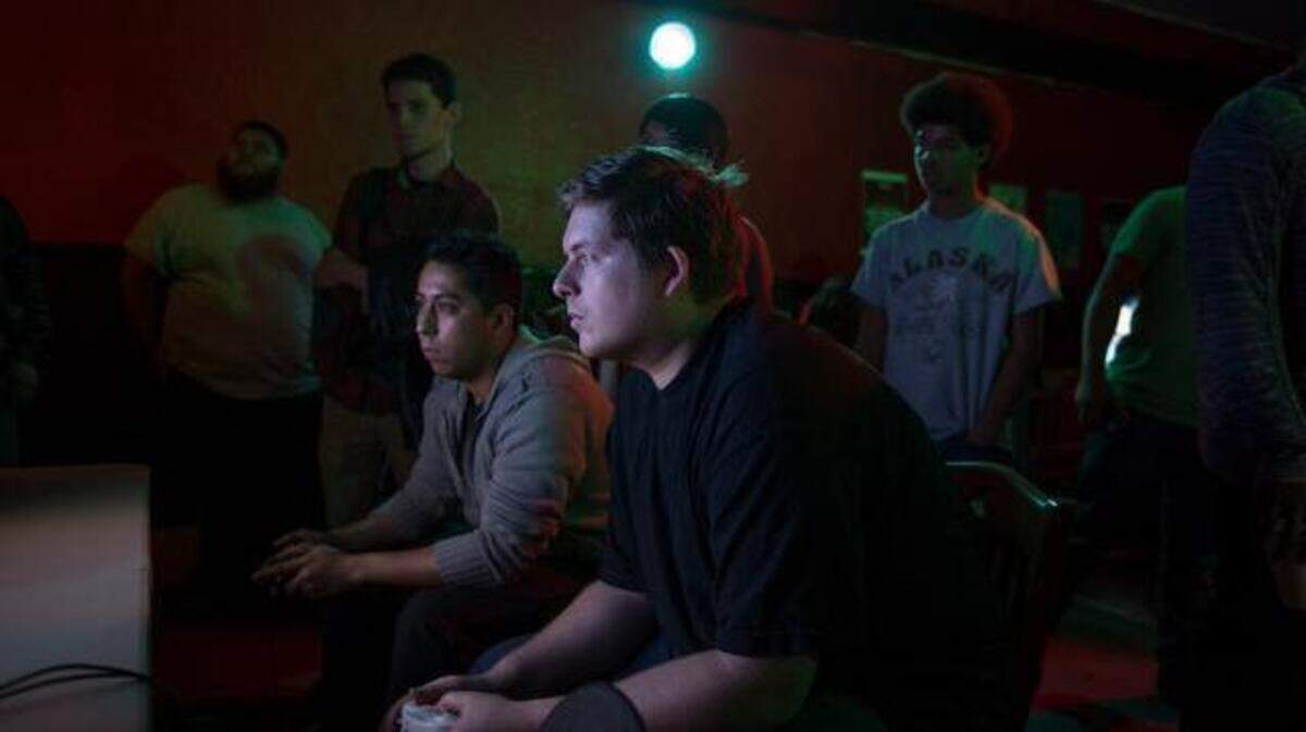 Britton Green plays against Gerardo Mendoza at the Retro Console Gaming night at Cafe Colonial in 2015.
