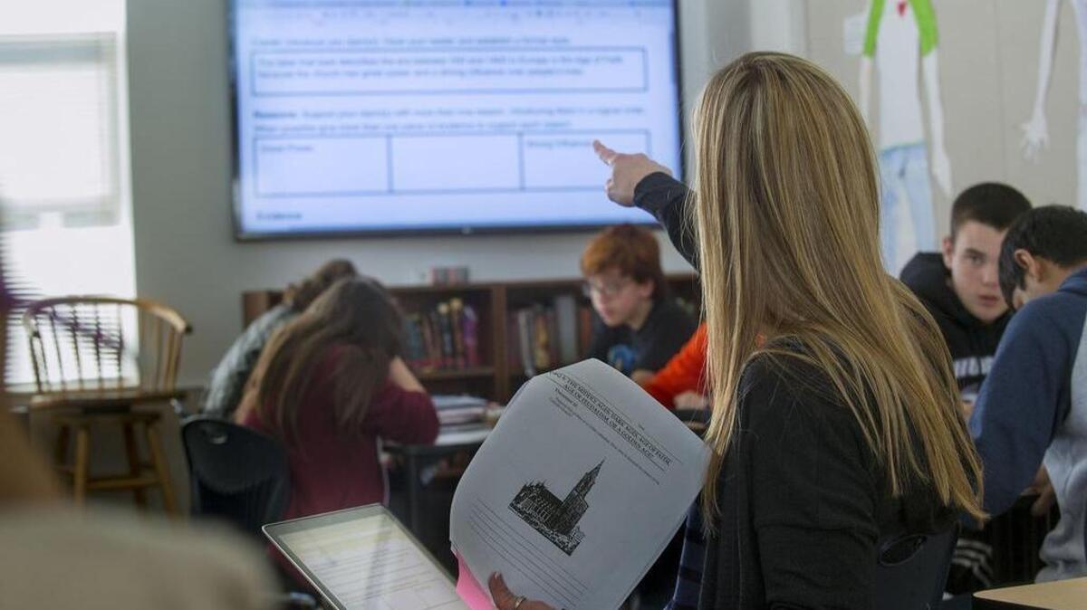 Kristen Manchester uses a laptop computer and a large-screen TV to teach her history class at Winston Churchill Middle School in Carmichael in February.