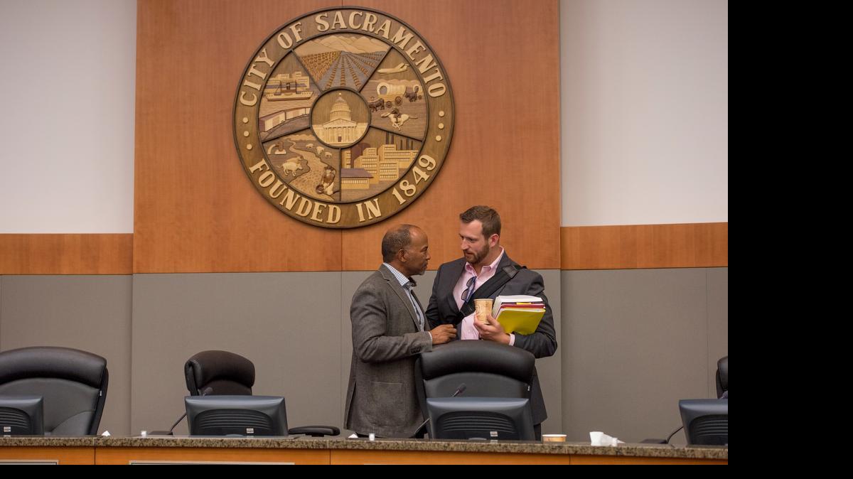 
Councilman Steve Hansen, right, has been a vocal critic of the Mayor Kevin Johnson’s moves to fortify his office. Here Hansen talks with Vice Mayor Allen Warren on May 12 after a testy exchange between the two during a council meeting. 
