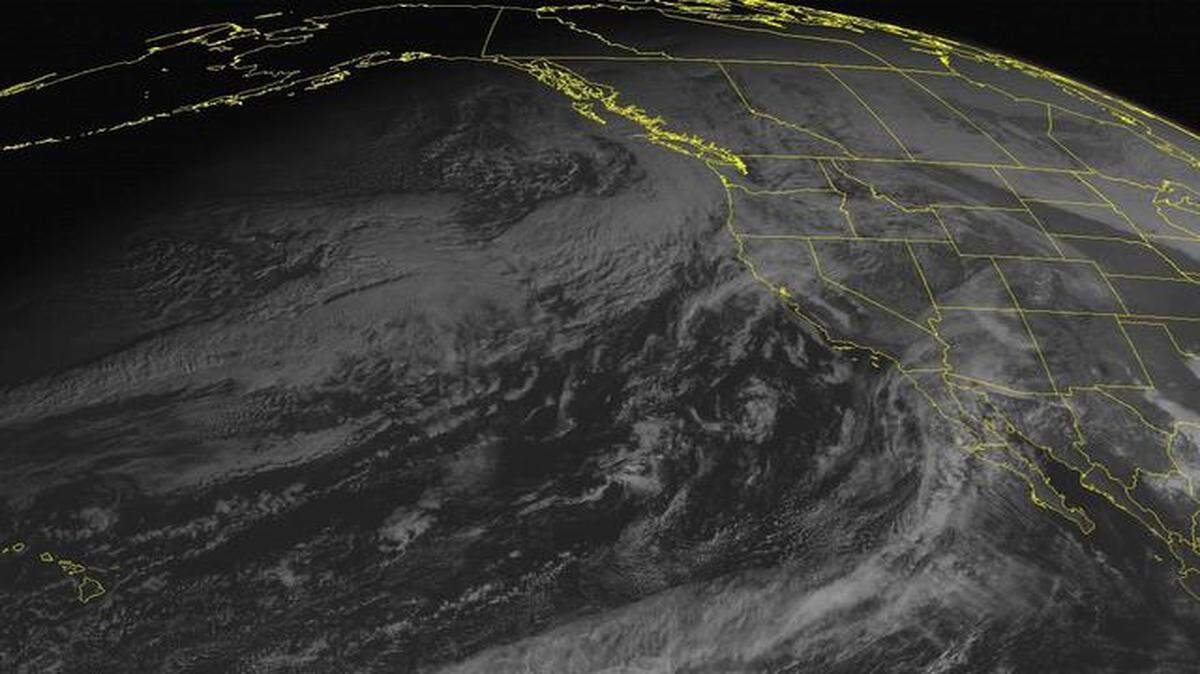 
This NOAA satellite image taken Monday shows that massive storm front in the northern Pacific Ocean bearing down on the Pacific Northwest and Northern California. Experts predict heavy precipitation and winds will scour and soak the region beginning Wednesday.
