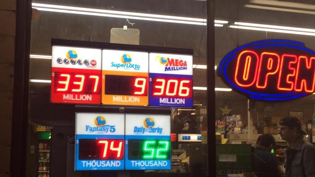 A sign at a Sacramento liquor store on Dec. 27 displays the prize amounts for lottery games. The California Lottery postponed a sales conference planned in August 2018 in the wake of an anonymous employee’s complaint to Gov. Jerry Brown about senior leaders behaving inappropriately at a Southern California bar two years ago.