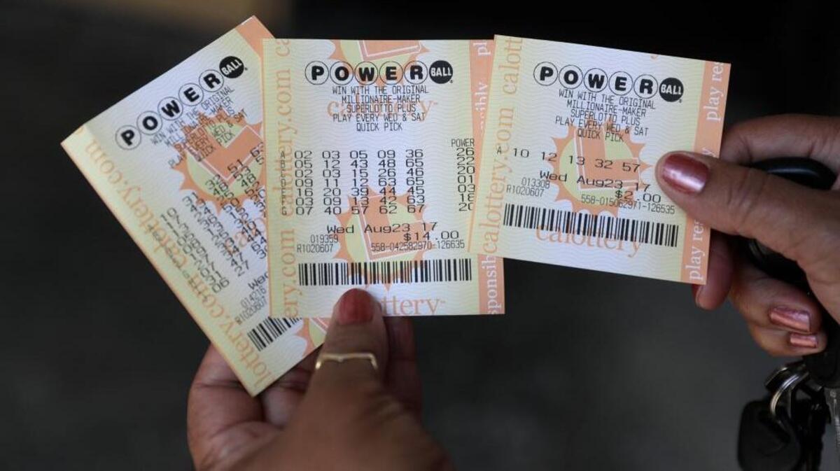 Powerball tickets are shown outside a Fremont liquor store in August. For the first time, both of the nation’s large lottery games, Powerball and Mega Millions, have jackpots of more than $400 million at the same time.