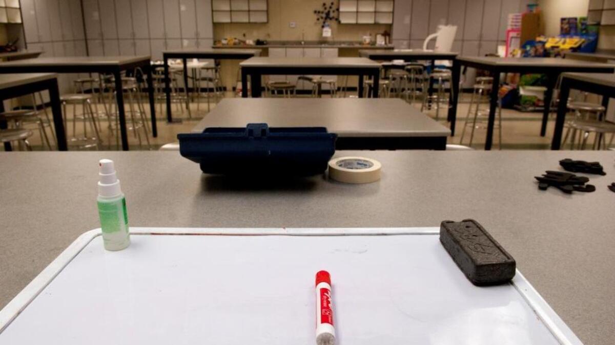 FILE -- An empty seventh-grade science classroom St. Mel School in Fair Oaks, California.