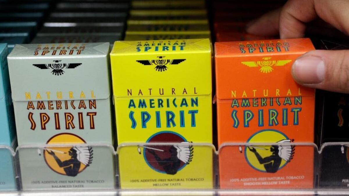 FILE - In this Tuesday, Feb. 1, 2011 file photo, Reynolds American cigarette brand American Spirit are on display at a liquor store in Palo Alto, Calif.