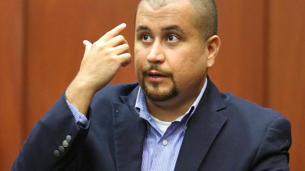 
George Zimmerman describes his alleged injuries as he testifies during a hearing for accused shooter Matthew Apperson, Tuesday, Sept. 22, 2015, in Seminole circuit court in Sanford, Fla. 
