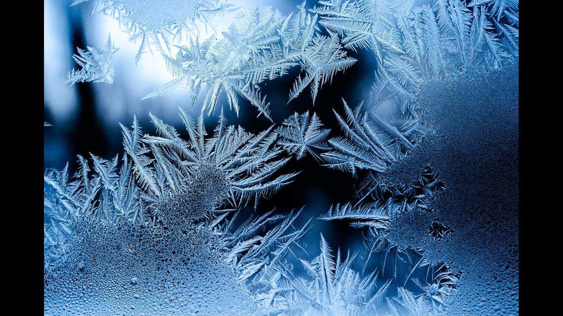 Two men are missing in Alaska after the ATV they were on broke through the ice on a river, officials said.