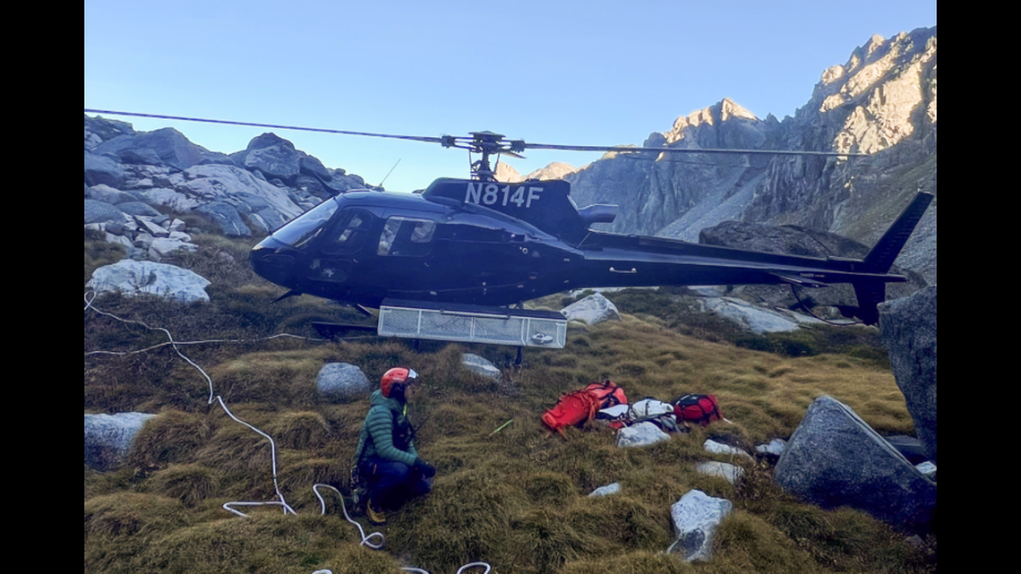 A rescuer was lowered to the climbers, who were both put into a rescue harness and “hauled to safety,” deputies said.