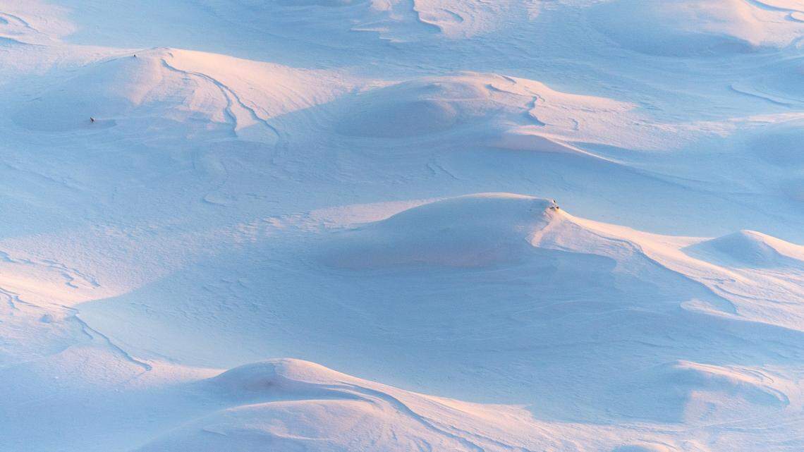 Two missing snowmobilers were found dead after weather delayed search efforts, Alaska officials said.