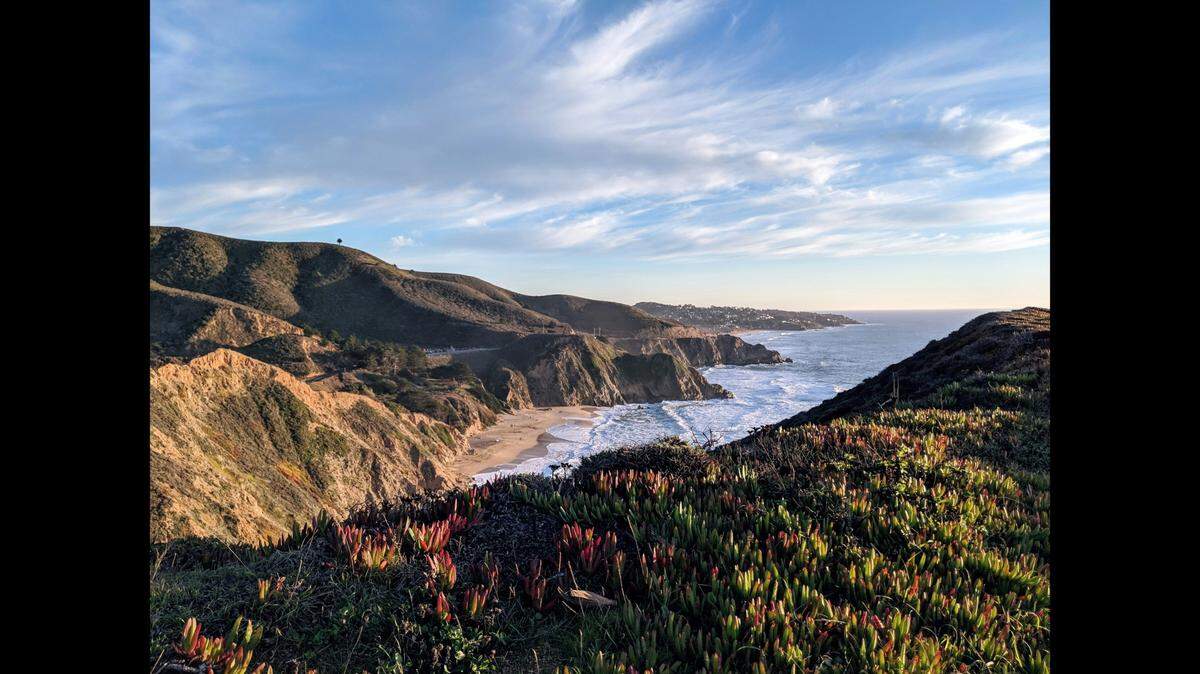 A woman’s body has been found after a small plane seen “flying erratically” crashed off California’s coast, a sheriff’s office says.