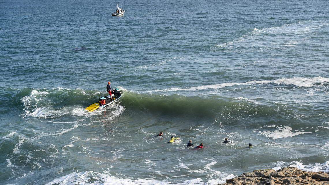 Searchers from several agencies looked for the missing swimmer using drones, aircraft and boats, firefighters said.