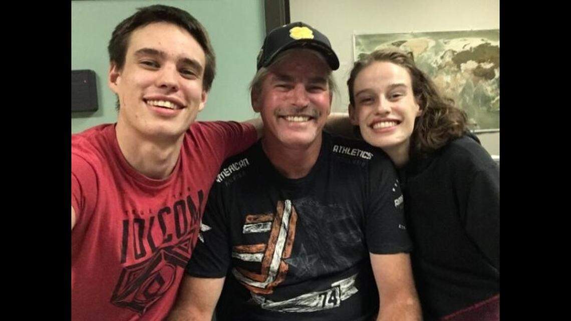 Brent Thompson pictured (left) with his father and sister. Months after a deputy used a Taser on a man on a Colorado interstate, where he was struck and killed by an SUV, the man’s family is suing.