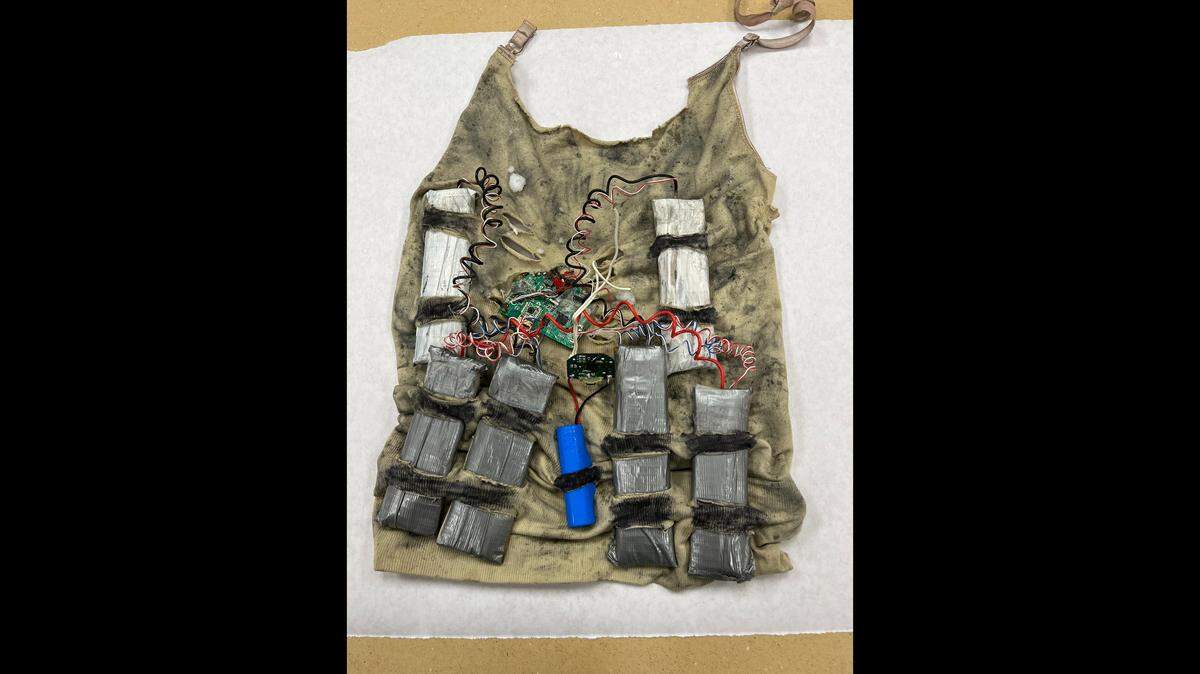 A man accused of wearing fake explosive vests into Oregon stores is heading to prison, officials said.