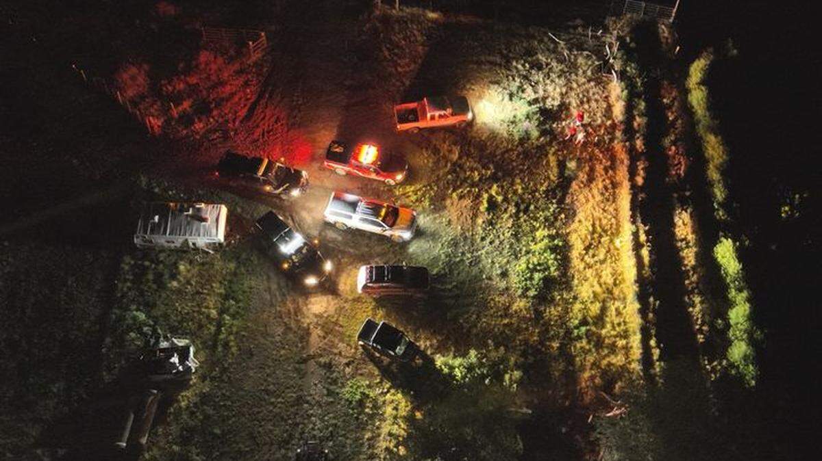 A boat hit by lightning in the Bear River near Corinne capsized, flinging three people into the water, where one died, Utah officials say.