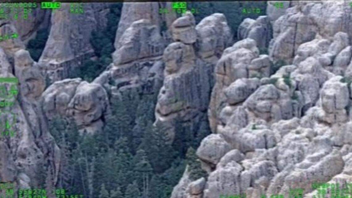 Two hikers were rescued after becoming stuck on cliffs in Utah, troopers said.