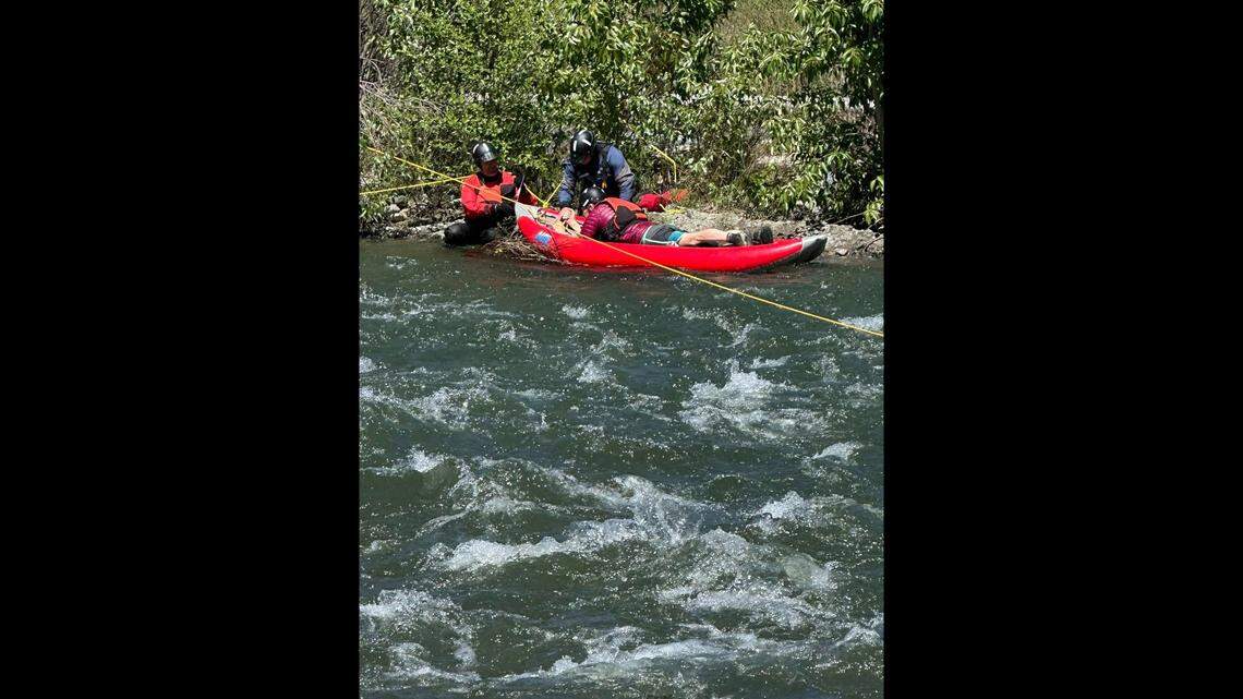 The man was placed in a kayak and brought to shore, rescuers said.