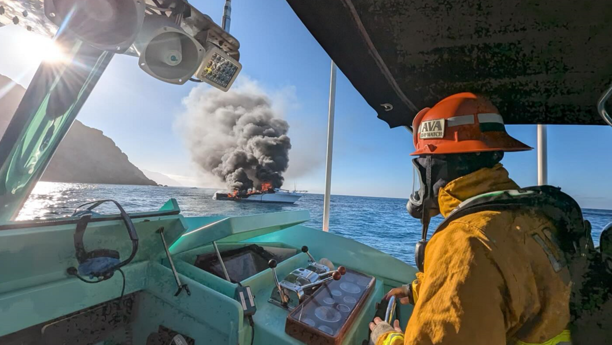 The boat sank 45 minutes after firefighters began battling the blaze, rescuers said.