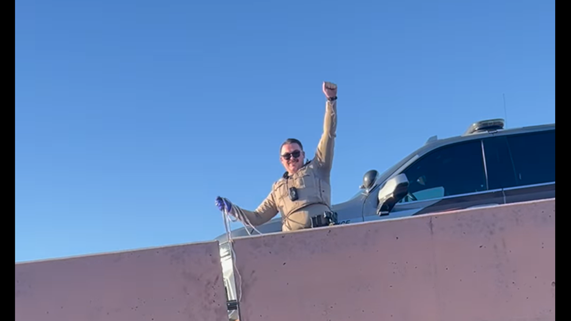 The kitten was rescued after troopers responded to a call about a man in need of help near a freeway, the Arizona Department of Safety said.