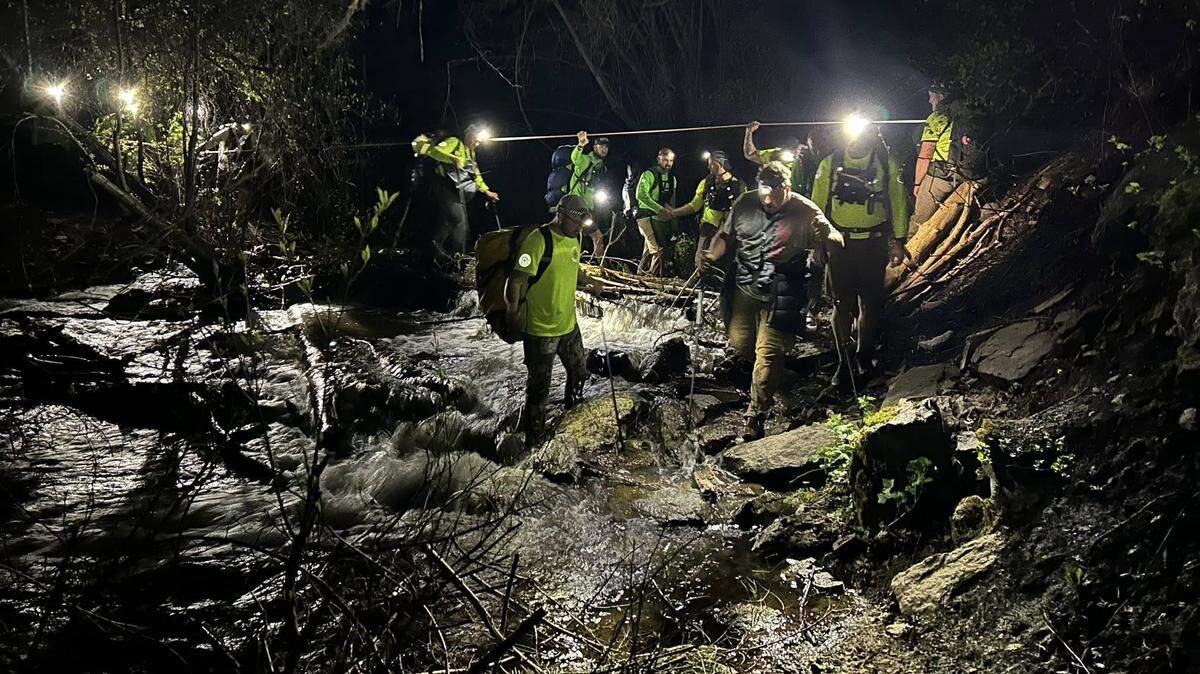 Rescuers navigated rough terrain in a dark Utah canyon to find a lost hang glider who had been blown off course by strong winds, officials said.