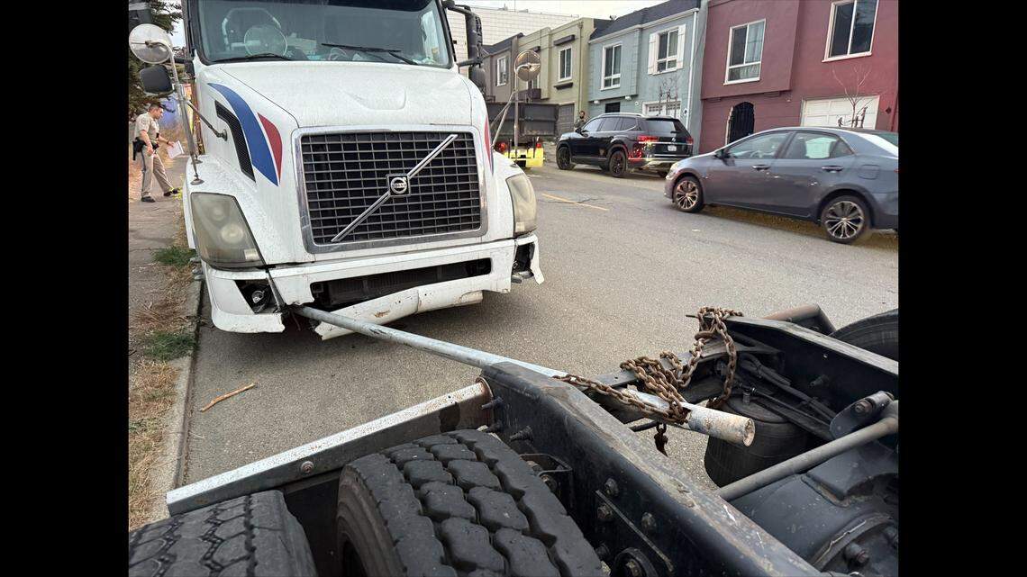 A big rig driver was cited after being spotted towing another big rig tractor with a pipe, officers say.