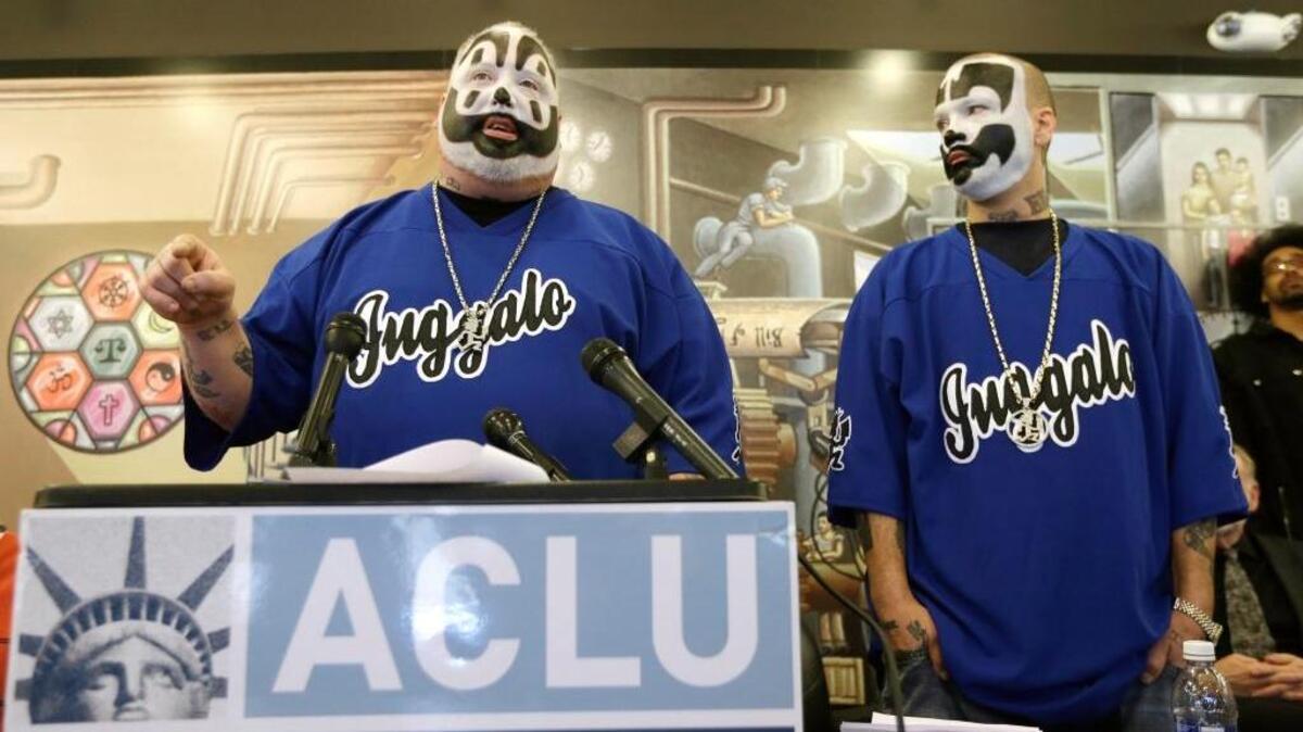 Joseph Bruce aka Violent J, left, and Joseph Utsler aka Shaggy 2 Dope, members of the music group Insane Clown Posse, address the media in Detroit on Jan. 8, 2014. Their fans, known as Juggalos, will protest Sept. 16 in Washington over being called a gang by the FBI.