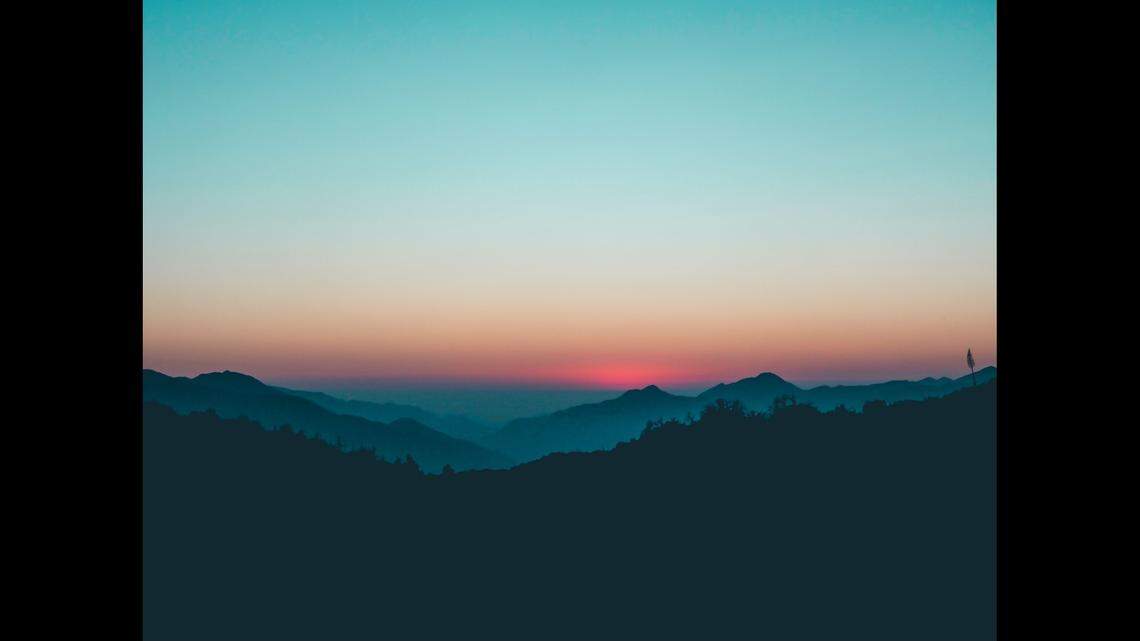 A hiker was rescued after climbing down a ladder in a California forest and getting stuck, rescue officials said.