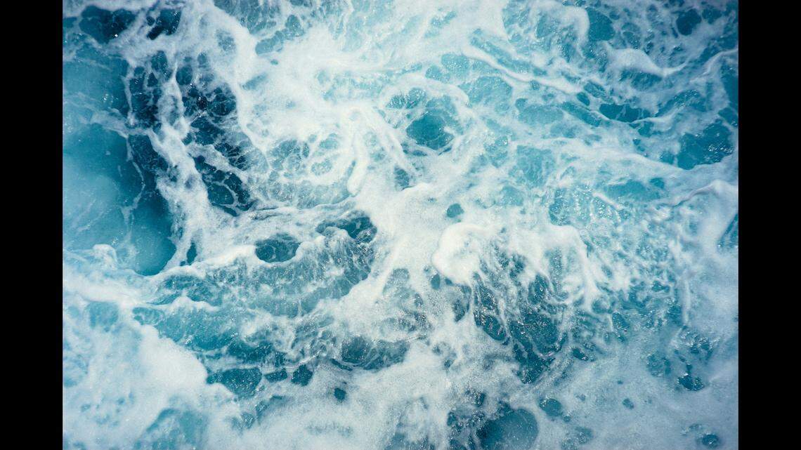 A woman died after falling from a Hawaii cliff and into the ocean, police say.