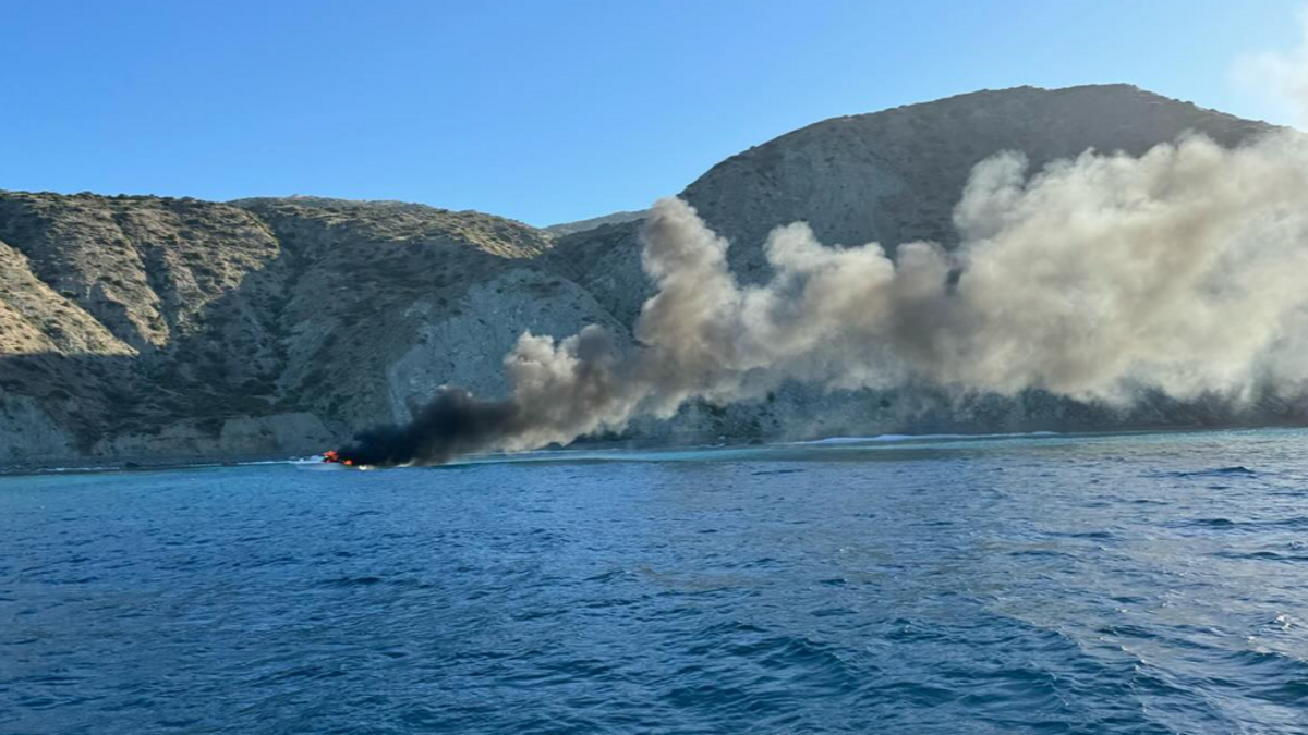 The boat burned close to a Catalina Island cliff face, according to rescuers.