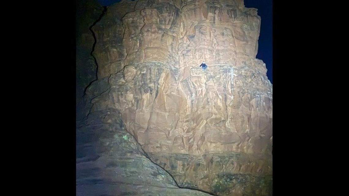 A hiker is pictured trapped on a ledge at Bell Rock, near Sedona, Arizona.