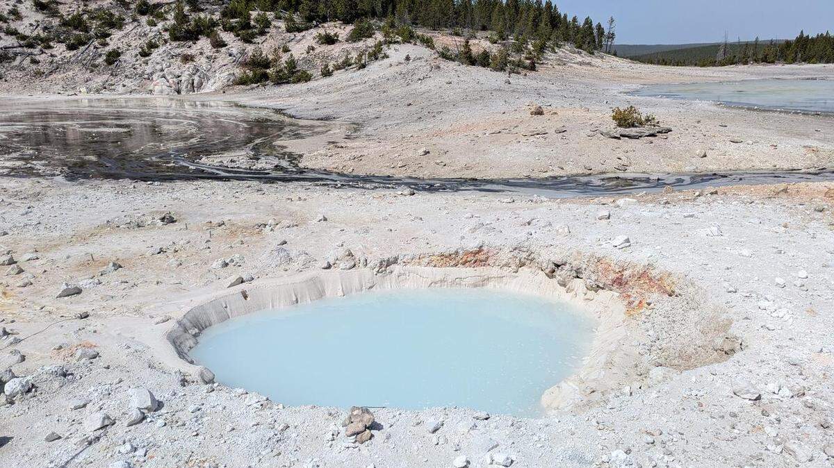 A brand new baby blue pool formed over the winter holidays in Yellowstone National Park, officials said.