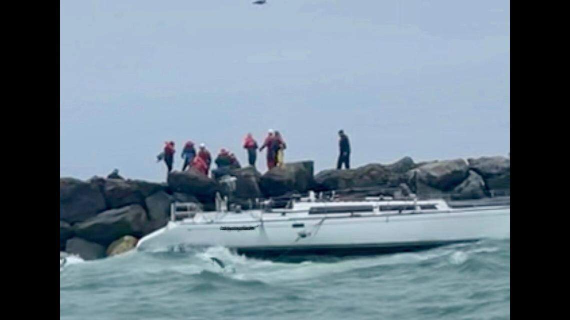 Nineteen people were rescued off the coast of California, after heavy winds broke a mast on a 40-foot long sailboat, rescuers said.