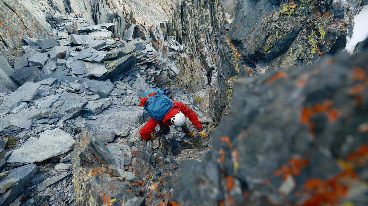Rescuers found two people trapped on an icy ridge at an elevation of 11,340 feet.