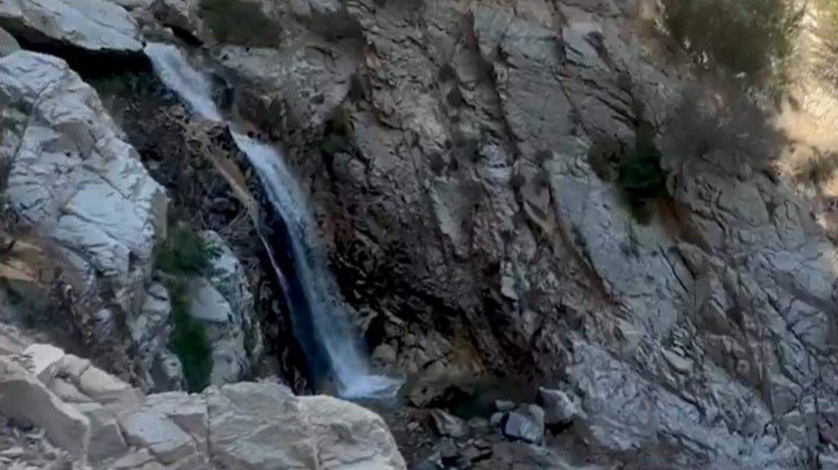 The San Bernardino County Fire Protection District said it got a report of a “hiker screaming for help midway up Big Falls” in Forest Falls.