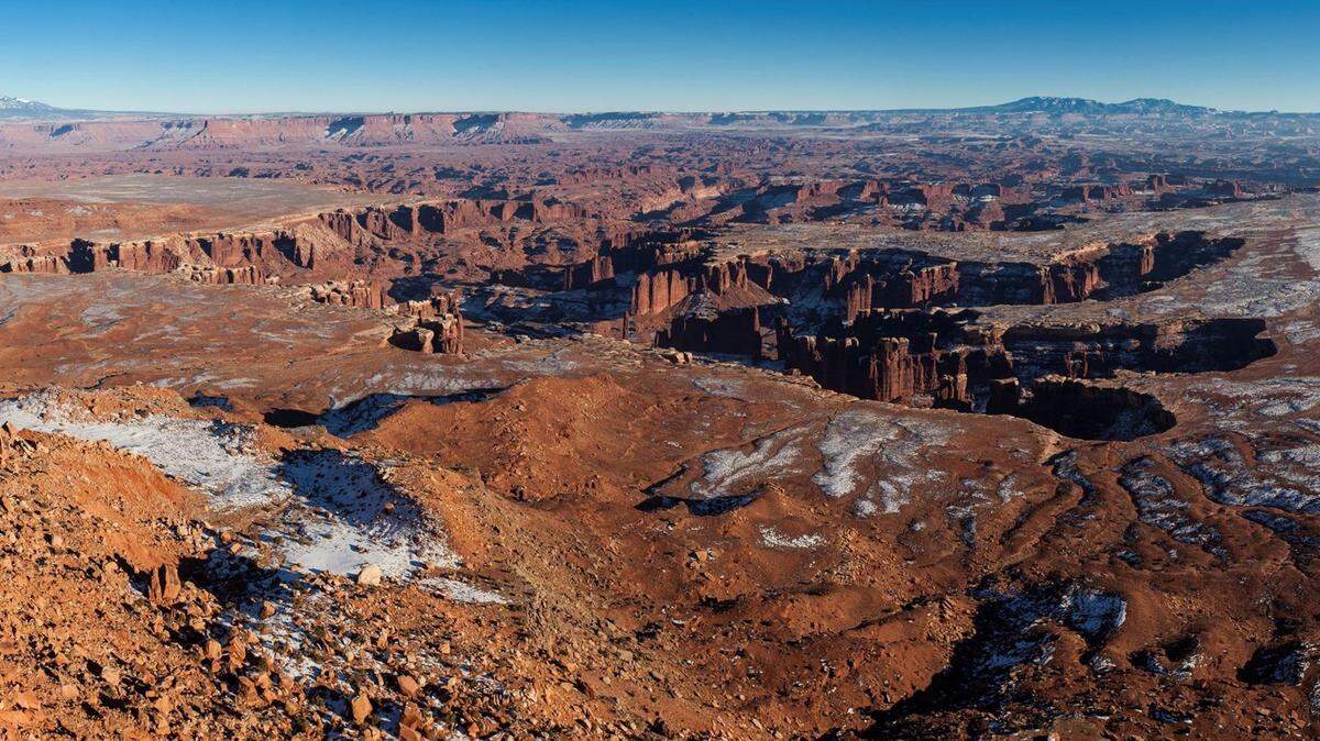 A 63-year-old woman died at the Grand View Point Overlook in Canyonlands National Park in Utah, rangers said.