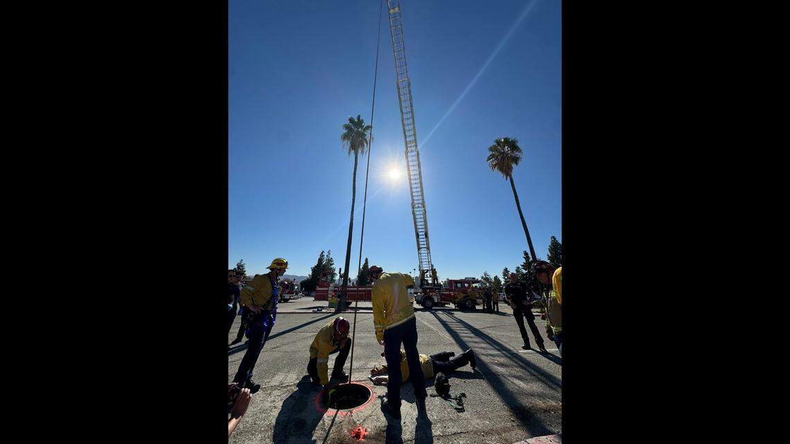 Fire officials said they used a a 100-foot aerial ladder for the woman’s rescue.