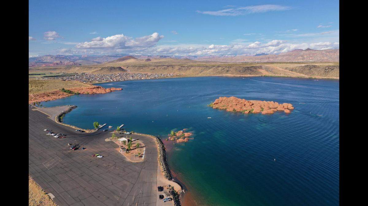 An 18-year-old died after vanishing under water while swimming with friends at a Utah state park, officials say.