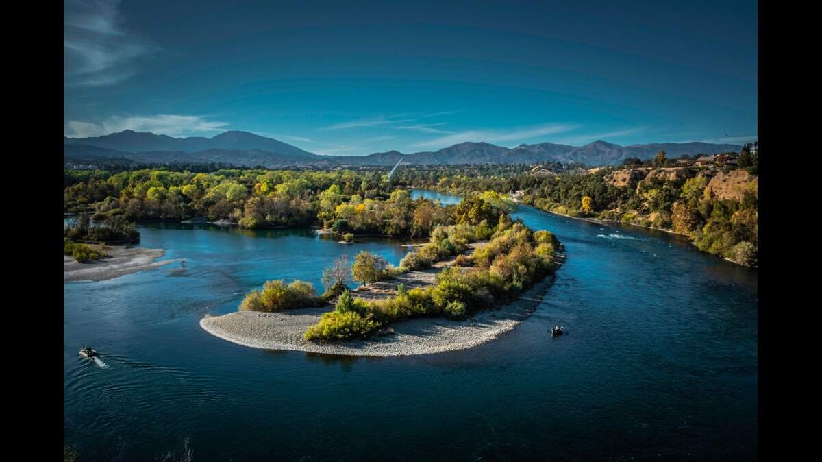 A family outing went awry when the mother’s kayak struck “a partially submerged tree,” throwing her into the swift-moving river, California deputies say.