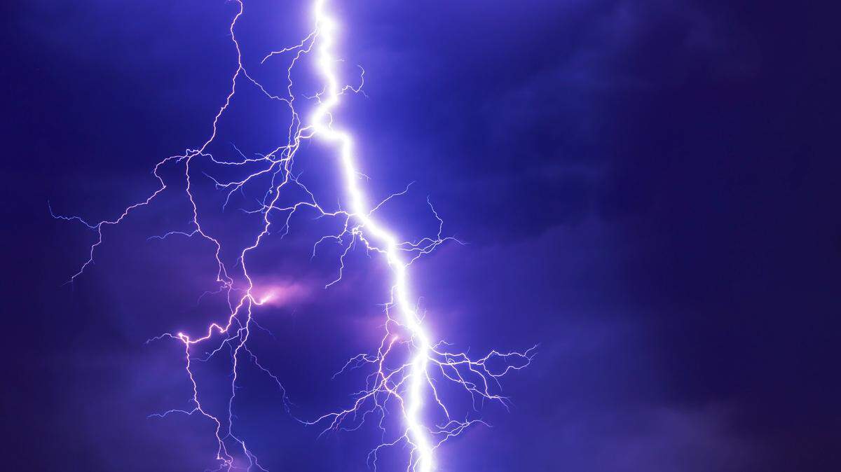 Lightning hit two players and a coach during soccer practice at a high school in Kalispell, Montana, educators say.