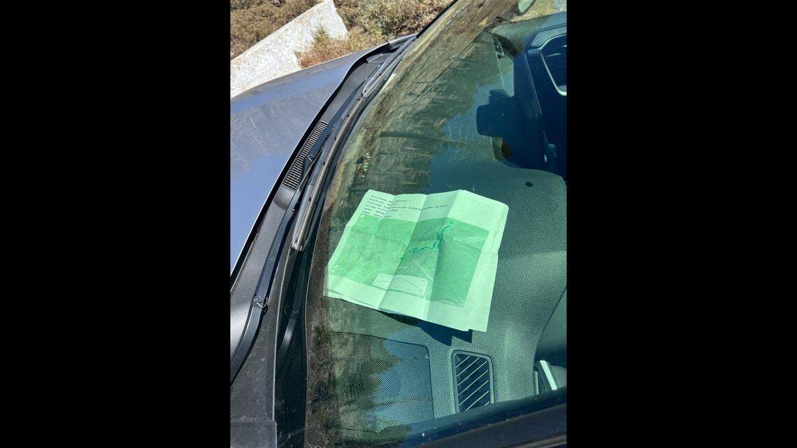 A map left on a hiker’s dashboard helped lead to his rescue, Los Angeles County rescuers say.