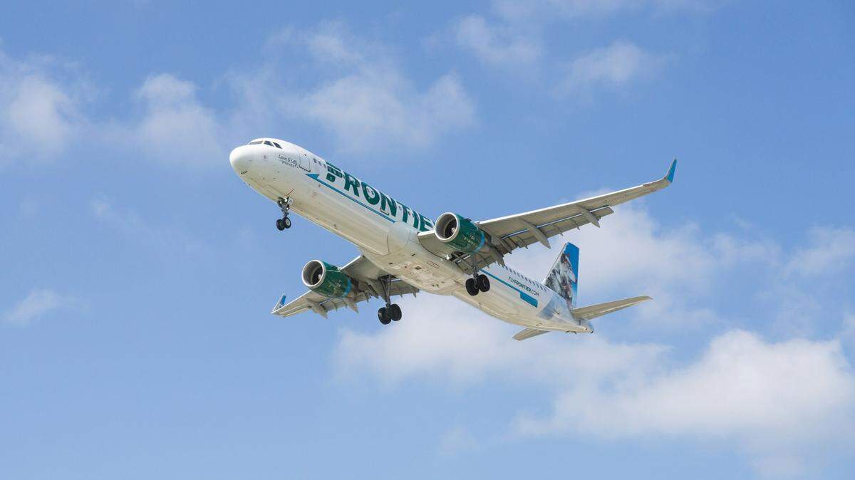 A passenger accused of fighting with airline attendants and causing a Frontier Airlines flight in California to be diverted faces federal charges, officials say.