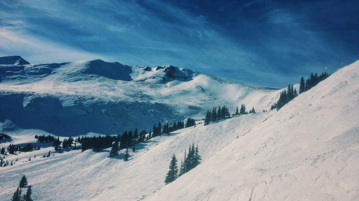 A father and daughter from California were hurt in a skiing collision with a ski biker, who took off after the crash, Colorado officials said.