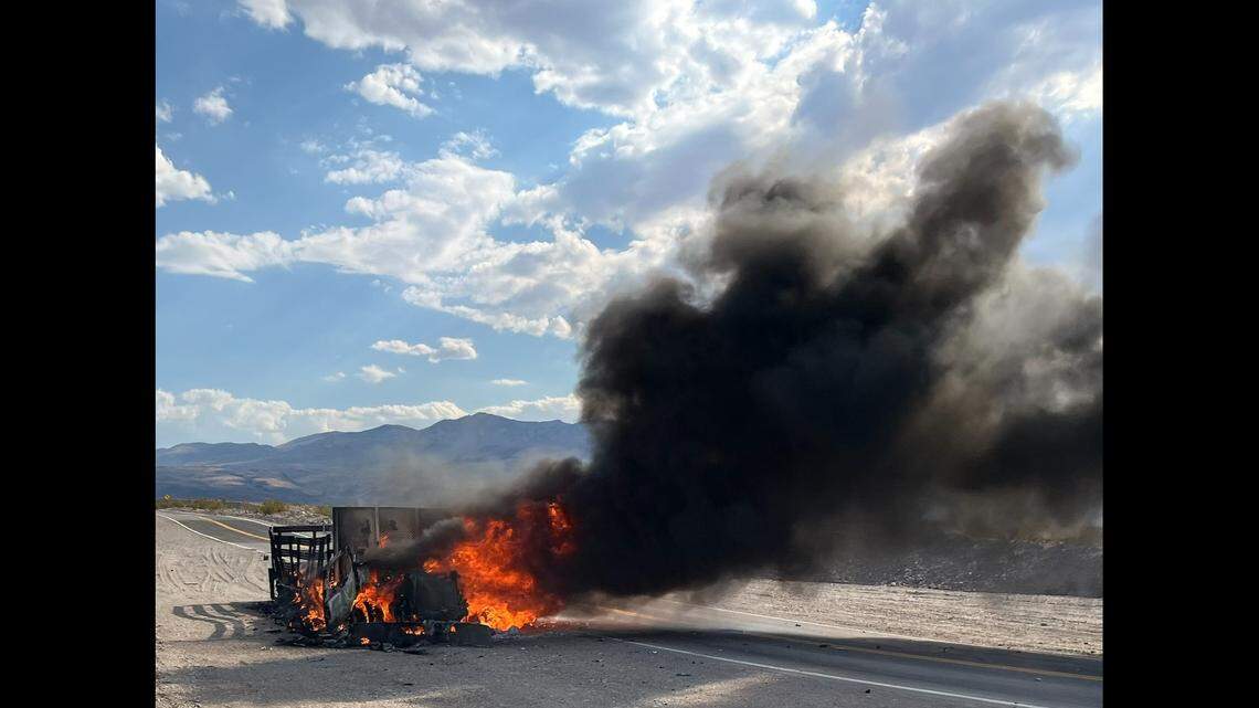A truck was engulfed in flames after catching fire in Death Valley amid triple-digit heat, rangers say.