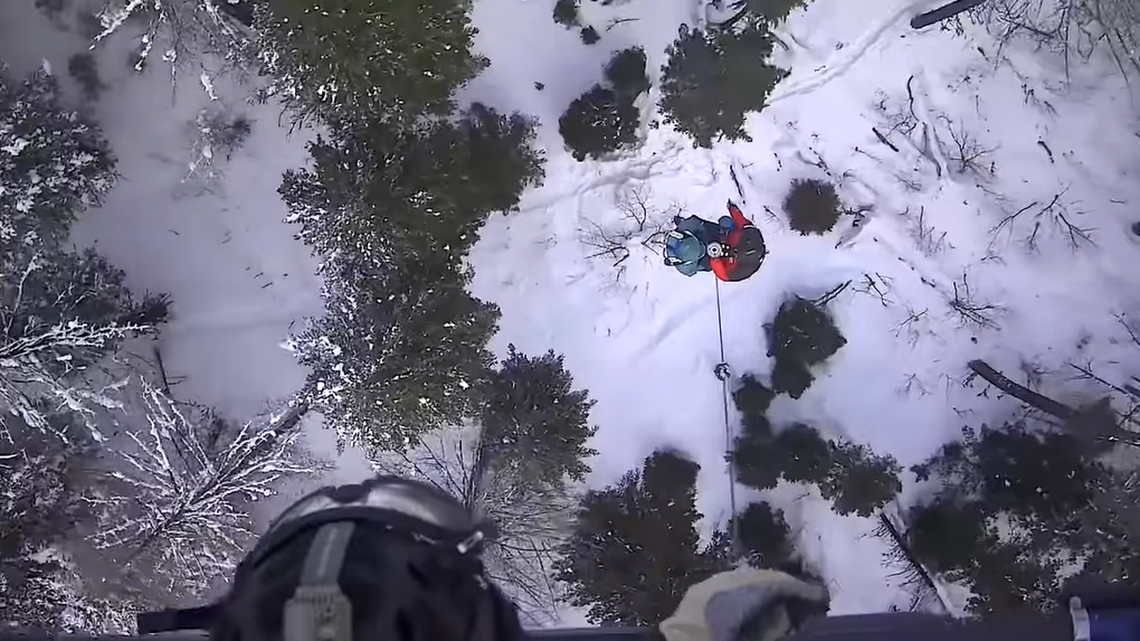 A 79-year-old skier spent the night in a tree well after becoming disoriented in Montana, officials said.