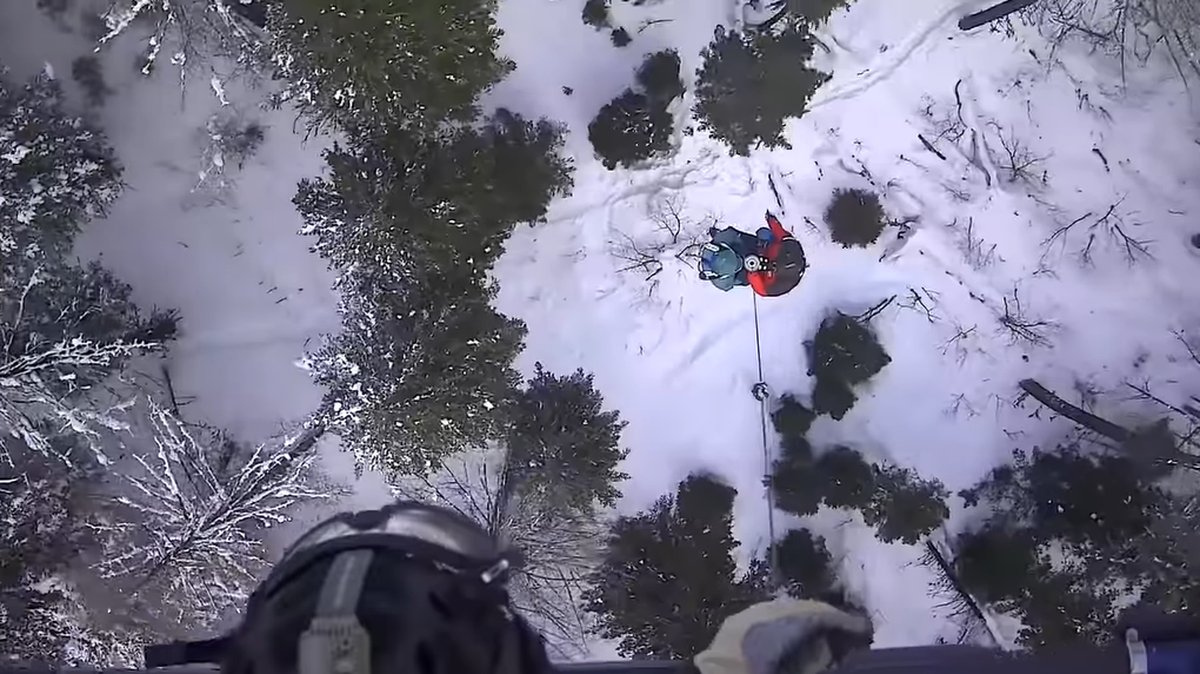 A 79-year-old skier spent the night in a tree well after becoming disoriented in Montana, officials said.