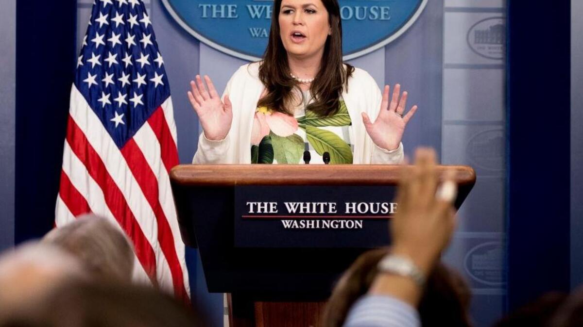 White House deputy press secretary Sarah Huckabee Sanders talks to the media during the daily press briefing at the White House, Monday, June 5, 2017, in Washington. Sanders discussed Trump's travel ban, health care, former FBI Director James Comey testifying to Congress and other topics. On Saturday, June 10, 2017, Sanders’ son tweeted a series of incoherent emojis and letters.