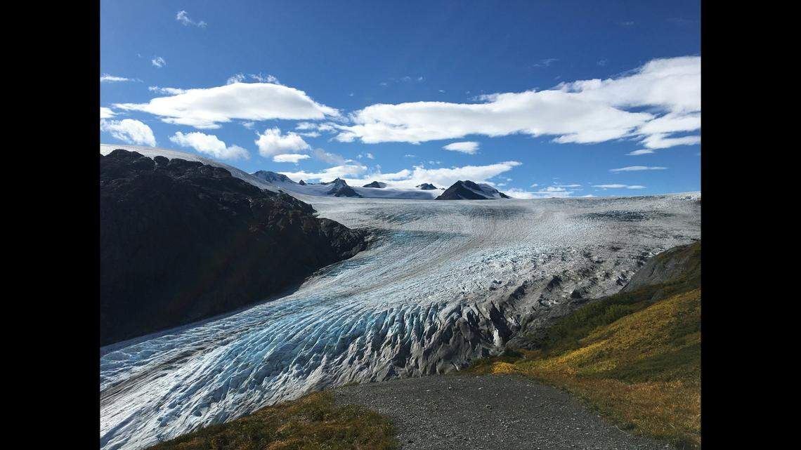 A man died after being swept away in an avalanche with two other backcountry skiers, Alaska troopers say.