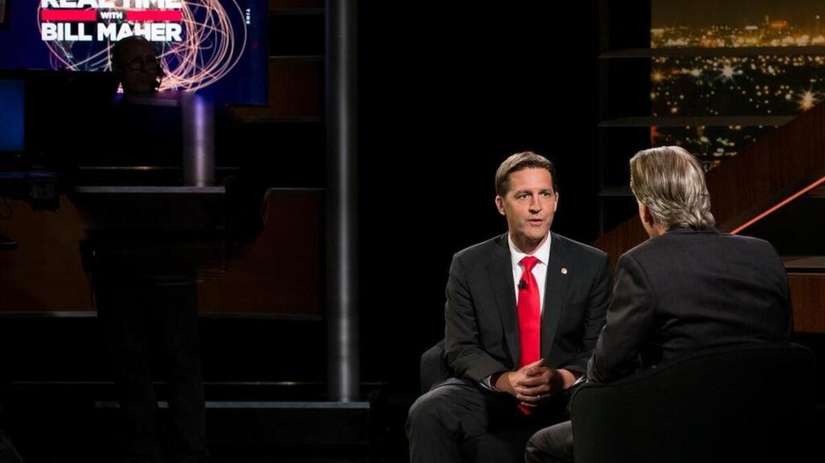 In this photo provided by HBO, Bill Maher, left, speaks with Sen. Ben Sasse, R-Neb, during a segment of his "Real Time with Bill Maher," Friday, June 2, 2017. Maher is facing criticism for his use of a racial slur during a discussion with the Republican senator on his HBO talk show Friday night.
