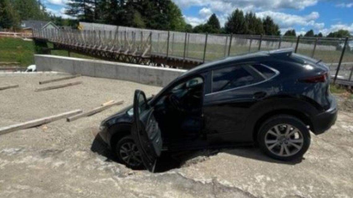 An accused bank robber drove his SUV into a hole in a road construction zone, leading to his arrest, Oregon police say.